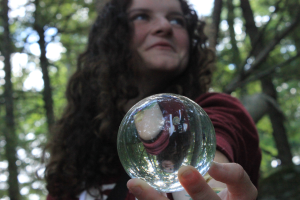 Camper holding a bubble with reflection